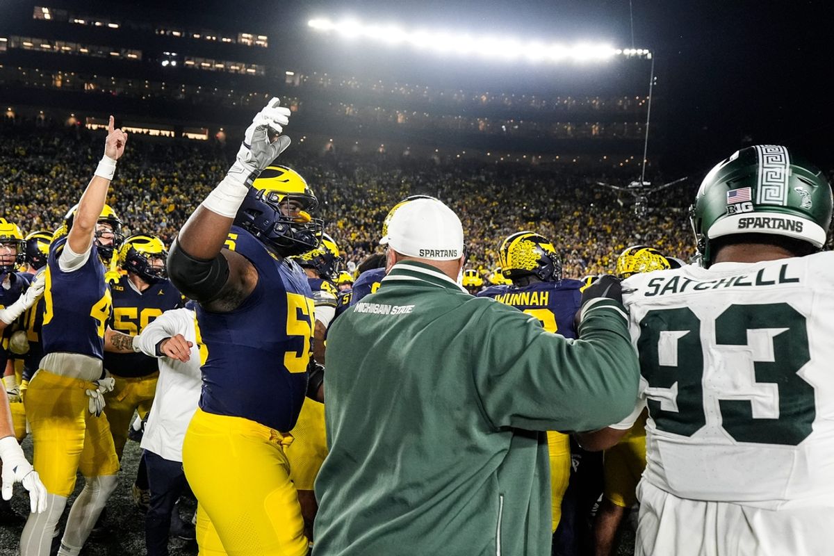 Michigan and Michigan State players get into a fight on the field as time expires at Michigan Stadium in Ann Arbor on Saturday, Oct. 26, 2024.