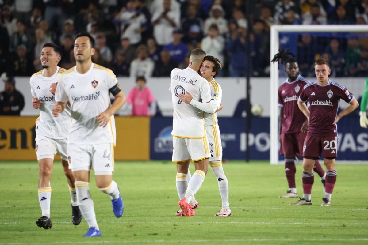 Oct 26, 2024; Carson, California, USA; Los Angeles Galaxy midfielder Riqui Puig (10) celebrates goal with forward Dejan Joveljic (9) in the second half against the Colorado Rapids in a 2024 MLS Cup Playoffs Round One match at Dignity Health Sports Park. Mandatory Credit: Bailey Holiver-Imagn Images