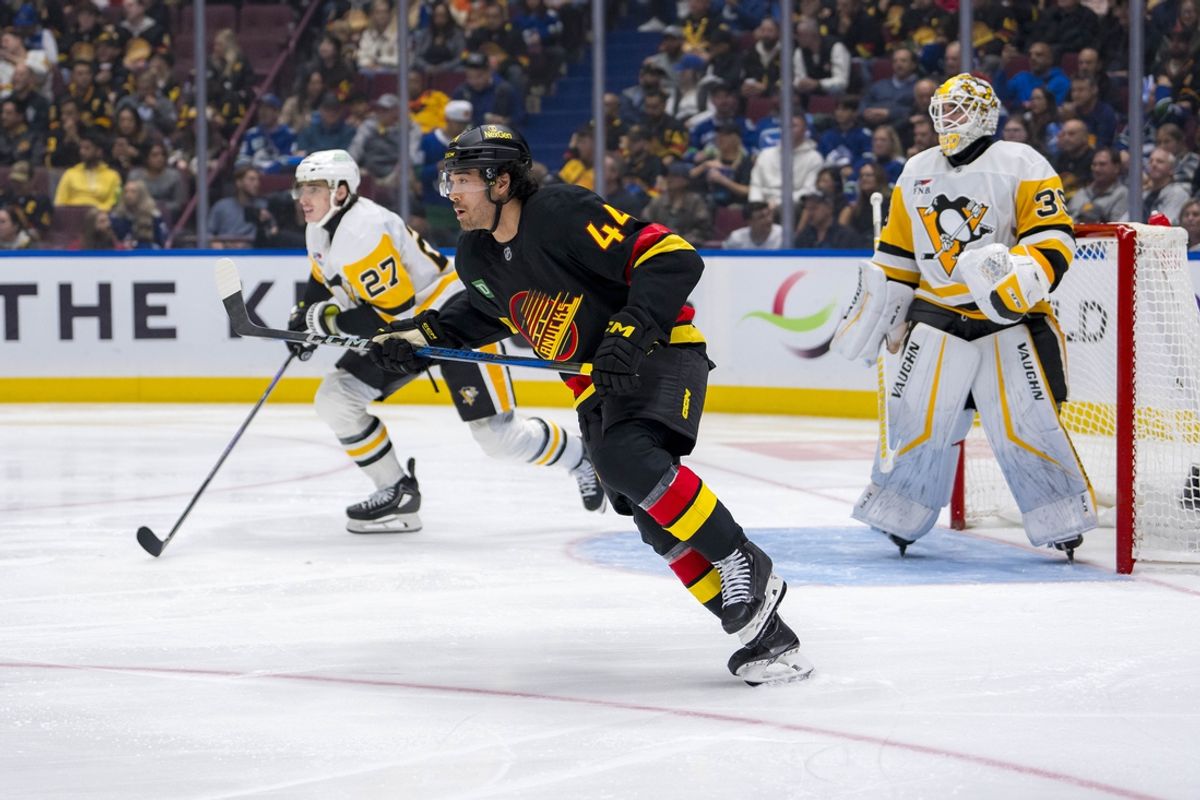 Oct 26, 2024; Vancouver, British Columbia, CAN; Vancouver Canucks forward Kiefer Sherwood (44) skates against the Pittsburgh Penguins during the third period at Rogers Arena. Mandatory Credit: Bob Frid-Imagn Images