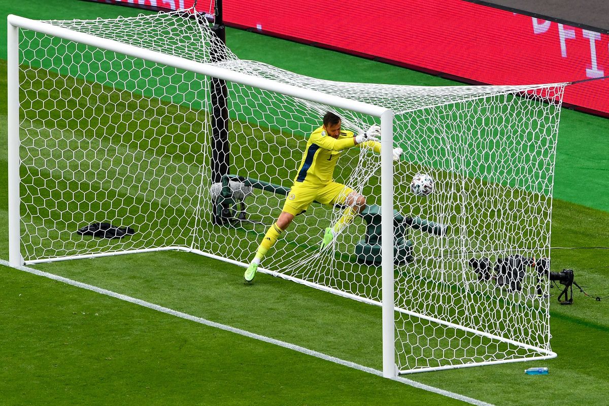 Scotland’s David Marshall got himself Spider-Manned up in the net but could not make the save.