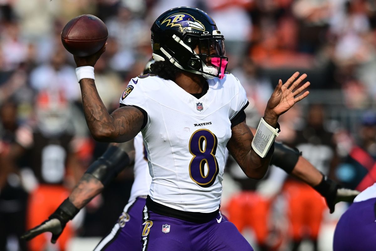 Oct 27, 2024; Cleveland, Ohio, USA; Baltimore Ravens quarterback Lamar Jackson (8) throws a pass during the first half against the Cleveland Browns at Huntington Bank Field. Mandatory Credit: Ken Blaze-Imagn Images