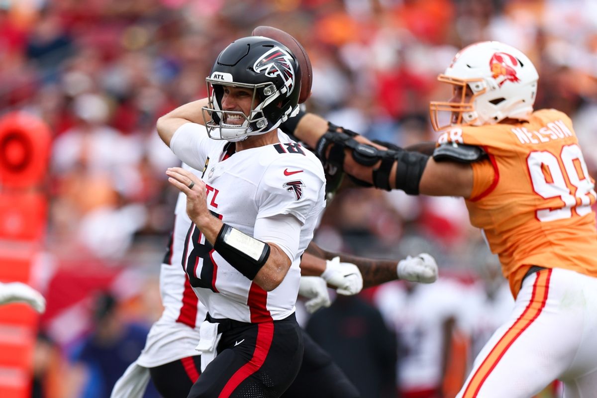Oct 27, 2024; Tampa, Florida, USA; Atlanta Falcons quarterback Kirk Cousins (18) drops back to pass against the Tampa Bay Buccaneers in the second quarter at Raymond James Stadium. Mandatory Credit: Nathan Ray Seebeck-Imagn Images