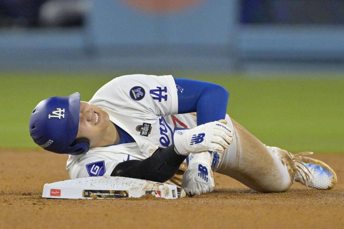 Oct 26, 2024; Los Angeles, California, USA; Los Angeles Dodgers designated hitter Shohei Ohtani (17) reacts at second base after an apparent injury in the seventh inning against the New York Yankees during game two of the 2024 MLB World Series at Dodger Stadium. Mandatory Credit: Jayne Kamin-Oncea-Imagn Images