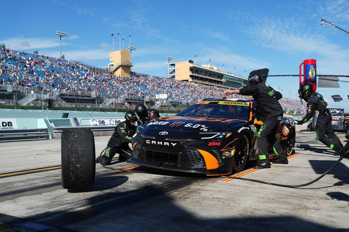 Oct 27, 2024; Homestead, Florida, USA; NASCAR Cup Series driver Tyler Reddick (45) pits for service during the Straight Talk Wireless 400 at Homestead-Miami Speedway. Mandatory Credit: Jasen Vinlove-Imagn Images