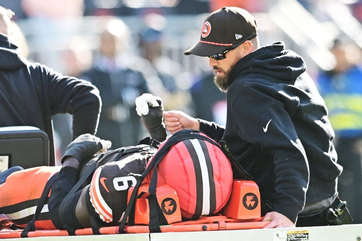 Oct 27, 2024; Cleveland, Ohio, USA; Cleveland Browns linebacker Jeremiah Owusu-Koramoah (6) is taken off the field with a neck injury  during the second half against the Baltimore Ravens at Huntington Bank Field. Mandatory Credit: Ken Blaze-Imagn Images