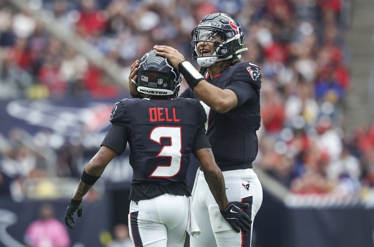 Oct 27, 2024; Houston, Texas, USA; Houston Texans quarterback C.J. Stroud (7) and wide receiver Tank Dell (3) react after a play during the fourth quarter against the Indianapolis Colts at NRG Stadium. Mandatory Credit: Troy Taormina-Imagn Images