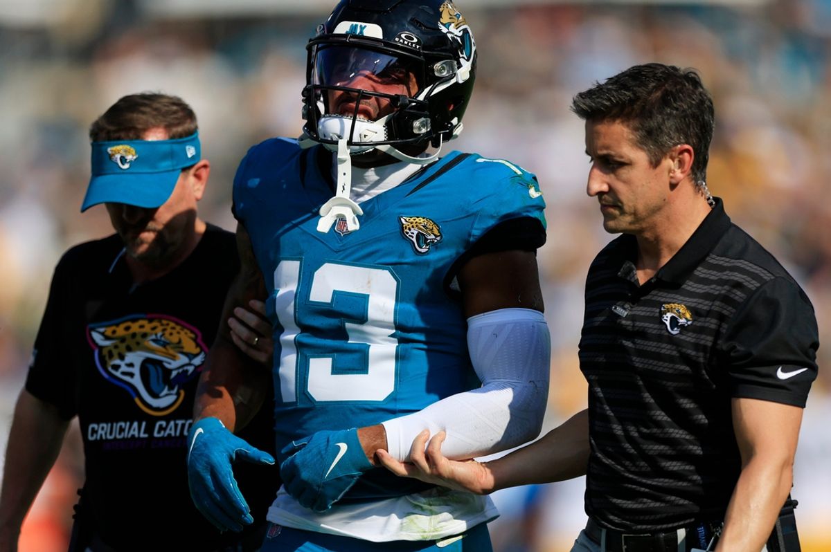 Jacksonville Jaguars wide receiver Christian Kirk (13) leaves the field to the locker room after sustaining an apparent injury during the fourth quarter of an NFL football matchup Sunday, Oct. 27, 2024 at EverBank Stadium in Jacksonville, Fla. The Packers edged the Jaguars 30-27 on a last-second field goal. [Corey Perrine/Florida Times-Union]