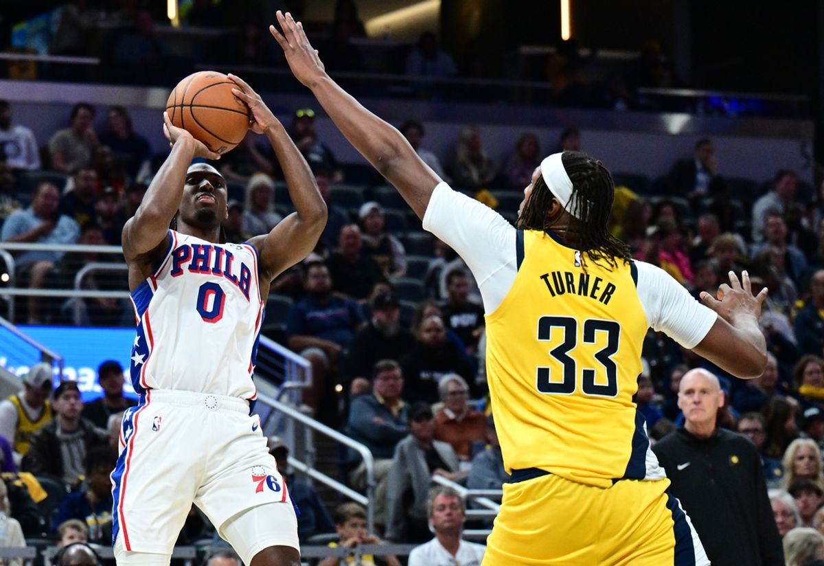 Oct 27, 2024; Indianapolis, Indiana, USA; Philadelphia 76ers guard Tyrese Maxey (0) shoots the ball over Indiana Pacers center Myles Turner (33) during the second half at Gainbridge Fieldhouse. Mandatory Credit: Marc Lebryk-Imagn Images