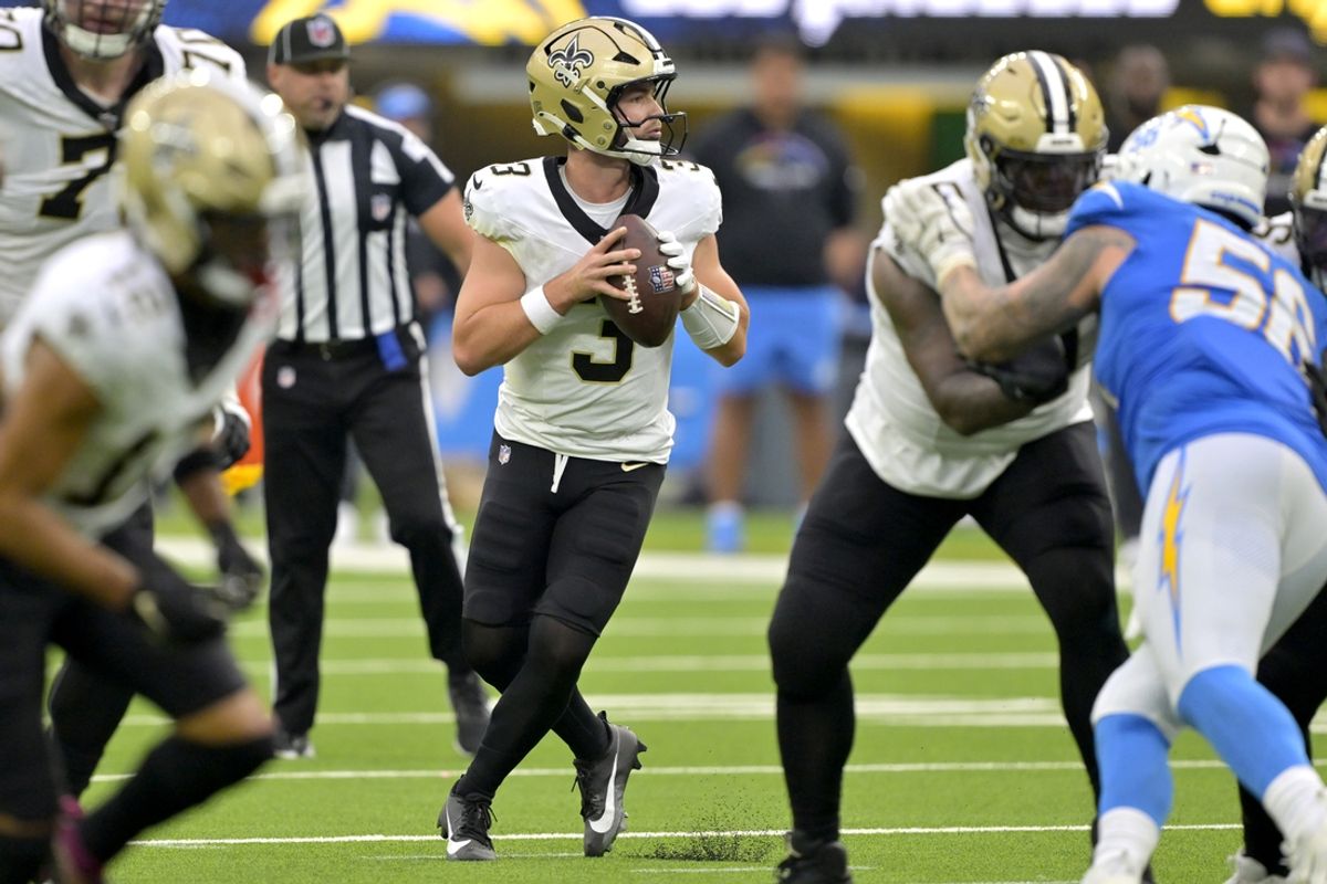 Oct 27, 2024; Inglewood, California, USA; New Orleans Saints quarterback Jake Haener (3) sets to pass in the second half against the against the Los Angeles Chargers at SoFi Stadium. Mandatory Credit: Jayne Kamin-Oncea-Imagn Images