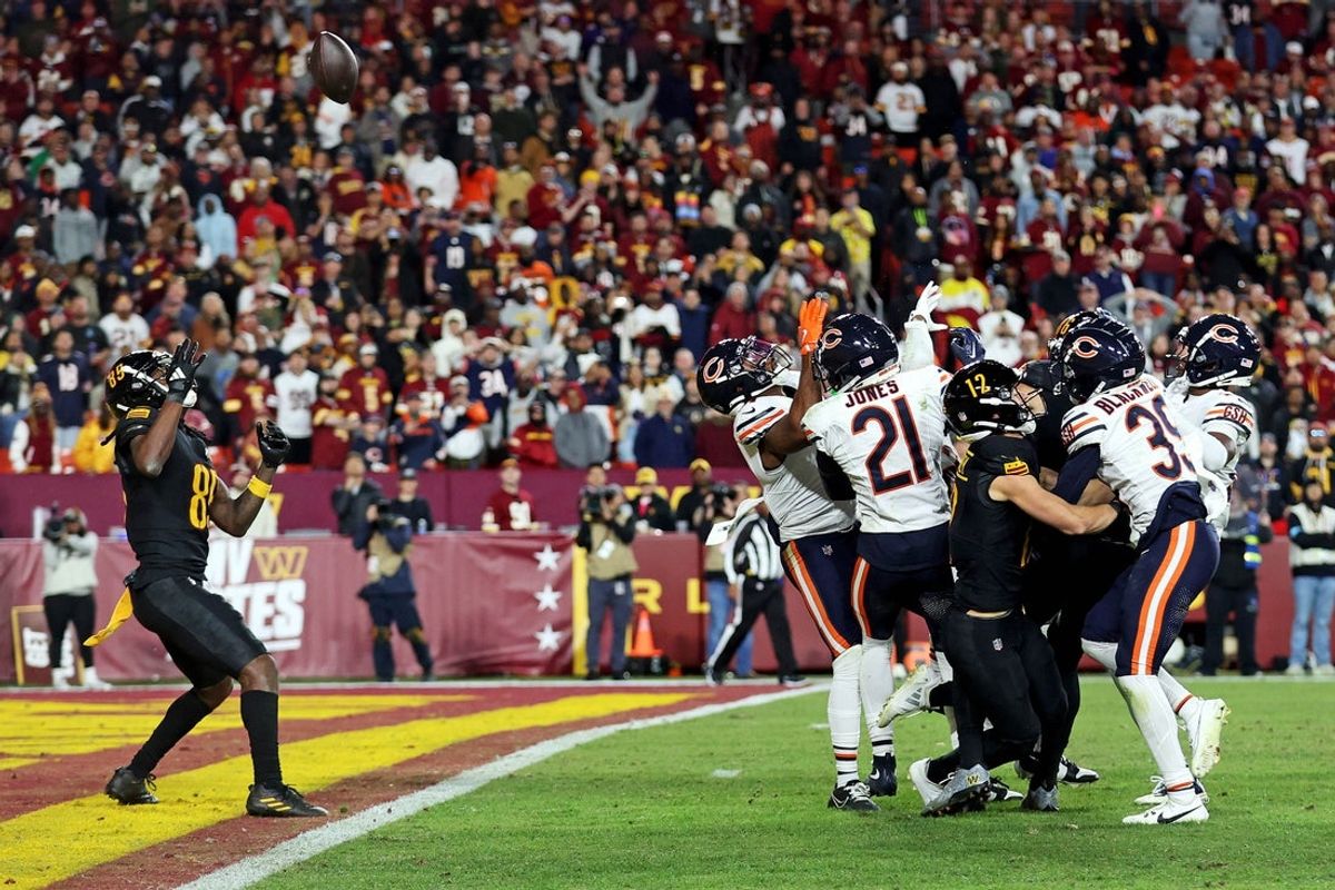 Oct 27, 2024; Landover, Maryland, USA; Washington Commanders wide receiver Noah Brown (85) catches a Hail Mary pass that was tipped with no time left to beat the Chicago Bears at Commanders Field. Mandatory Credit: Peter Casey-Imagn Images