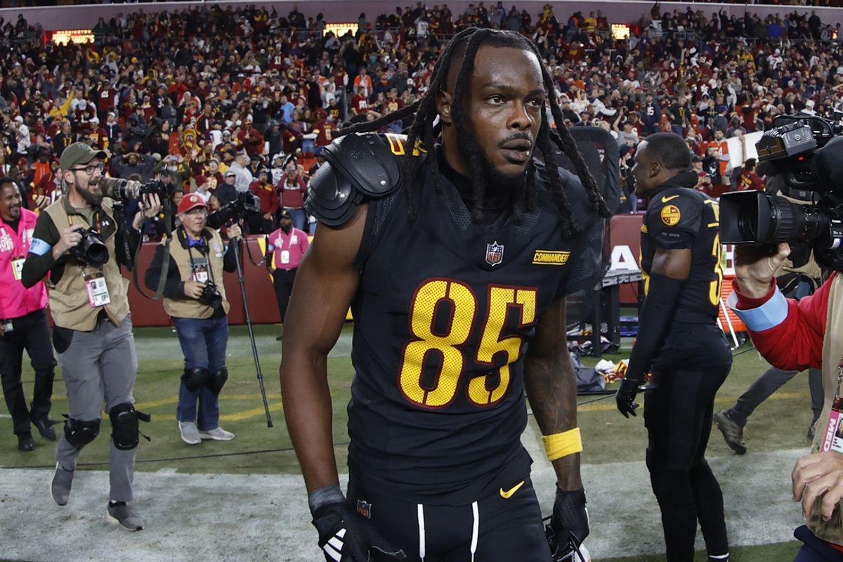 Oct 27, 2024; Landover, Maryland, USA; Washington Commanders wide receiver Noah Brown (85) celebrates after catching a game-winnning Hail Mary pass on the final play of the game against the Chicago Bears at Northwest Stadium. Mandatory Credit: Geoff Burke-Imagn Images