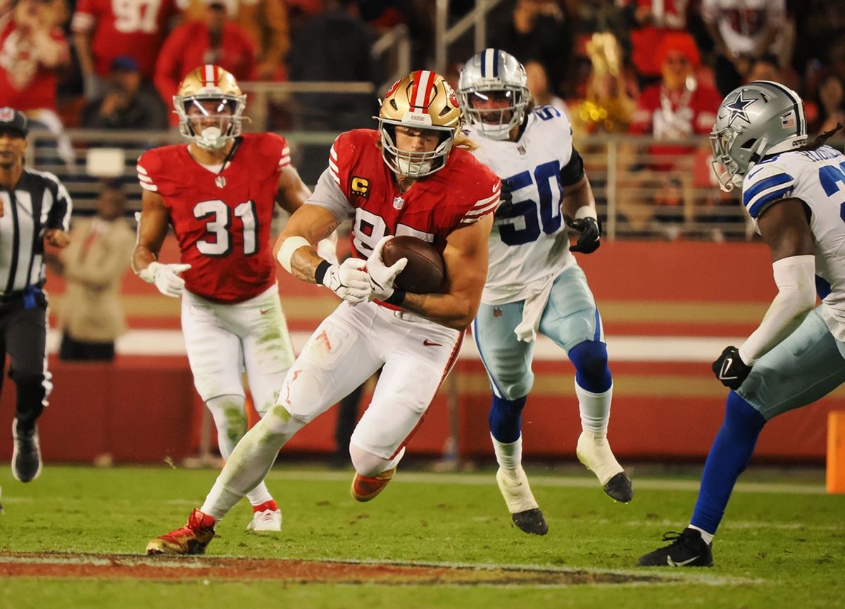 Oct 27, 2024; Santa Clara, California, USA; San Francisco 49ers tight end George Kittle (85) carries the ball against the Dallas Cowboys during the second quarter at Levi's Stadium. Mandatory Credit: Kelley L Cox-Imagn Images