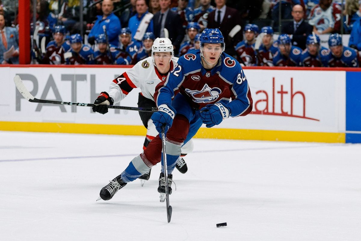 Oct 27, 2024; Denver, Colorado, USA; Colorado Avalanche center Ivan Ivan (82) controls the puck ahead of Ottawa Senators defenseman Jacob Bernard-Docker (24) in the second period at Ball Arena. Mandatory Credit: Isaiah J. Downing-Imagn Images