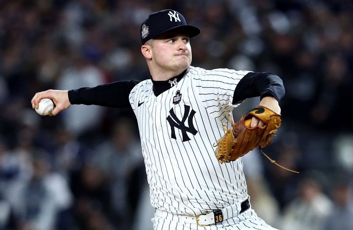 Oct 28, 2024; New York, New York, USA; New York Yankees pitcher Clarke Schmidt (36) throws during the first inning in game three of the 2024 MLB World Series against the Los Angeles Dodgers at Yankee Stadium. Mandatory Credit: Wendell Cruz-Imagn Images