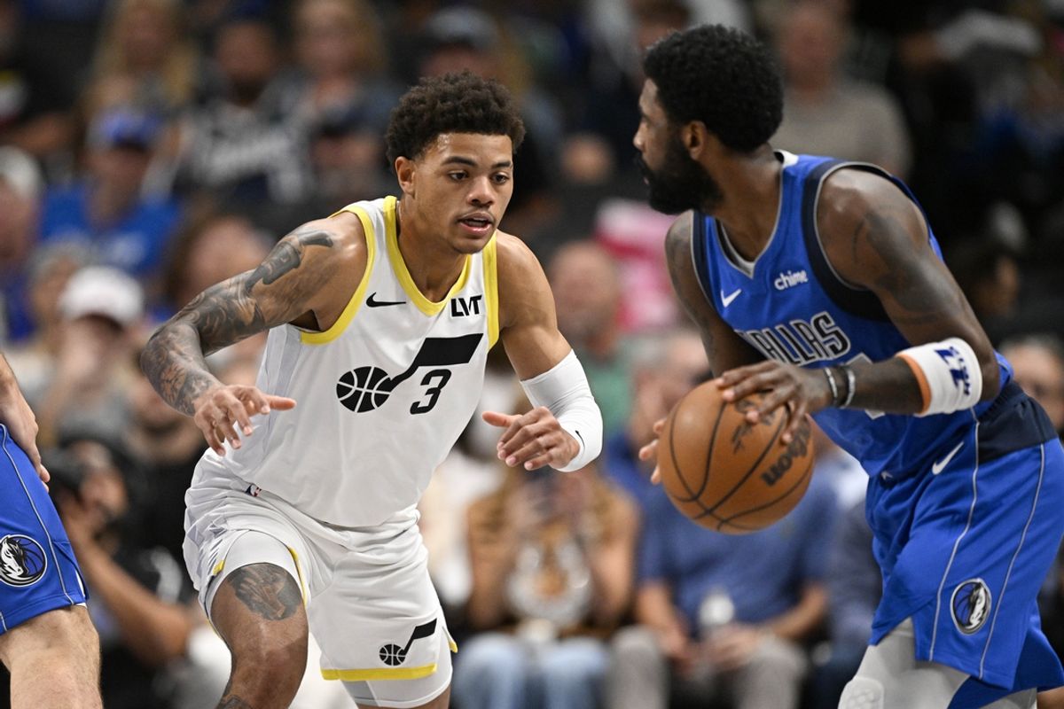 Oct 28, 2024; Dallas, Texas, USA; Dallas Mavericks guard Kyrie Irving (11) looks to move the ball past Utah Jazz guard Keyonte George (3) during the first quarter at the American Airlines Center. Mandatory Credit: Jerome Miron-Imagn Images