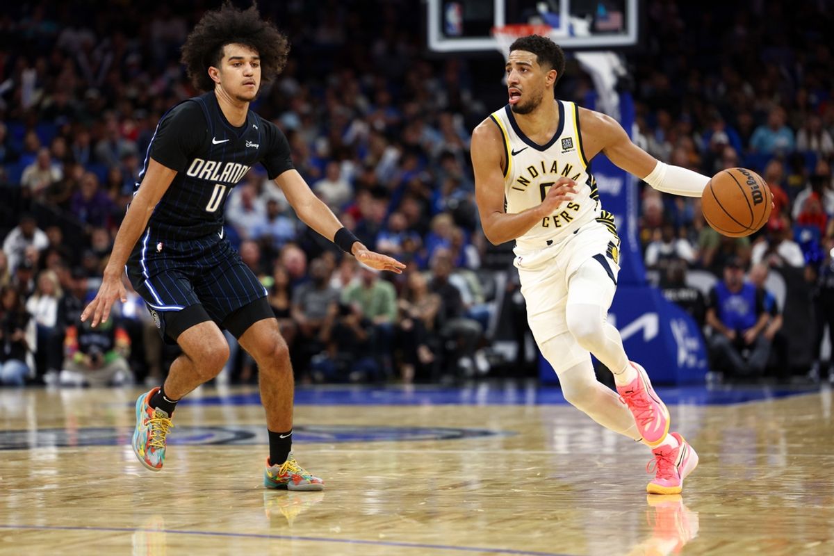 Oct 28, 2024; Orlando, Florida, USA; Indiana Pacers guard Tyrese Haliburton (0) is guarded by Orlando Magic guard Anthony Black (0) in the third quarter at Kia Center. Mandatory Credit: Nathan Ray Seebeck-Imagn Images
