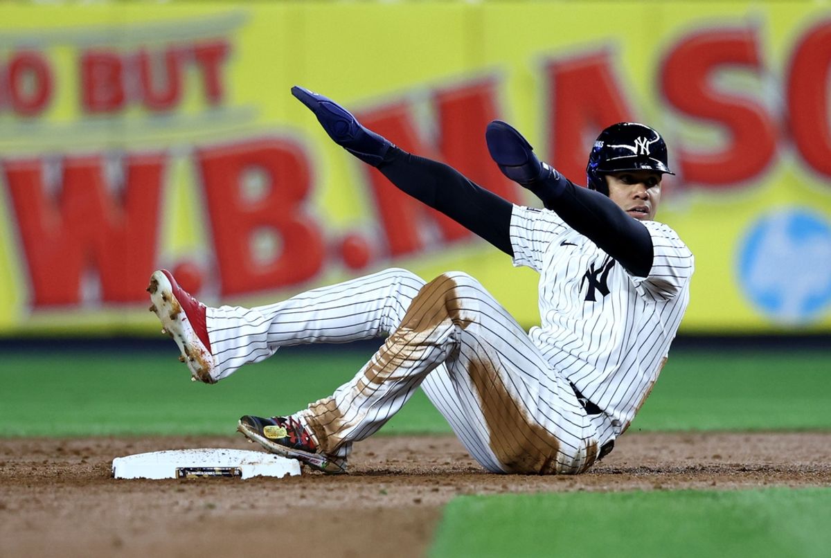 Oct 28, 2024; New York, New York, USA; New York Yankees outfielder Juan Soto (22) reacts after being called out during the sixth inning against the Los Angeles Dodgers in game three of the 2024 MLB World Series at Yankee Stadium. Mandatory Credit: Wendell Cruz-Imagn Images
