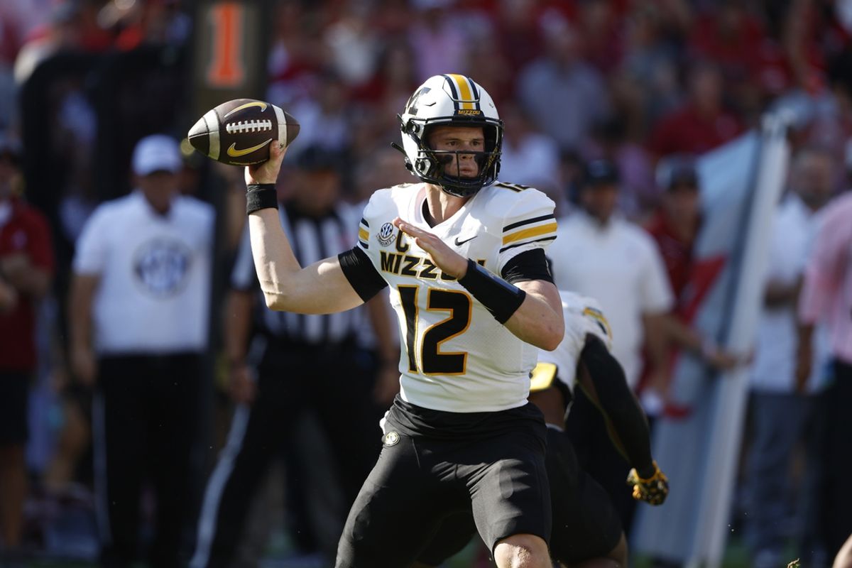 Oct 26, 2024; Tuscaloosa, Alabama, USA;  Missouri Tigers quarterback Brady Cook (12) throws a pass during the first half against the Alabama Crimson Tide at Bryant-Denny Stadium. Mandatory Credit: Butch Dill-Imagn Images
