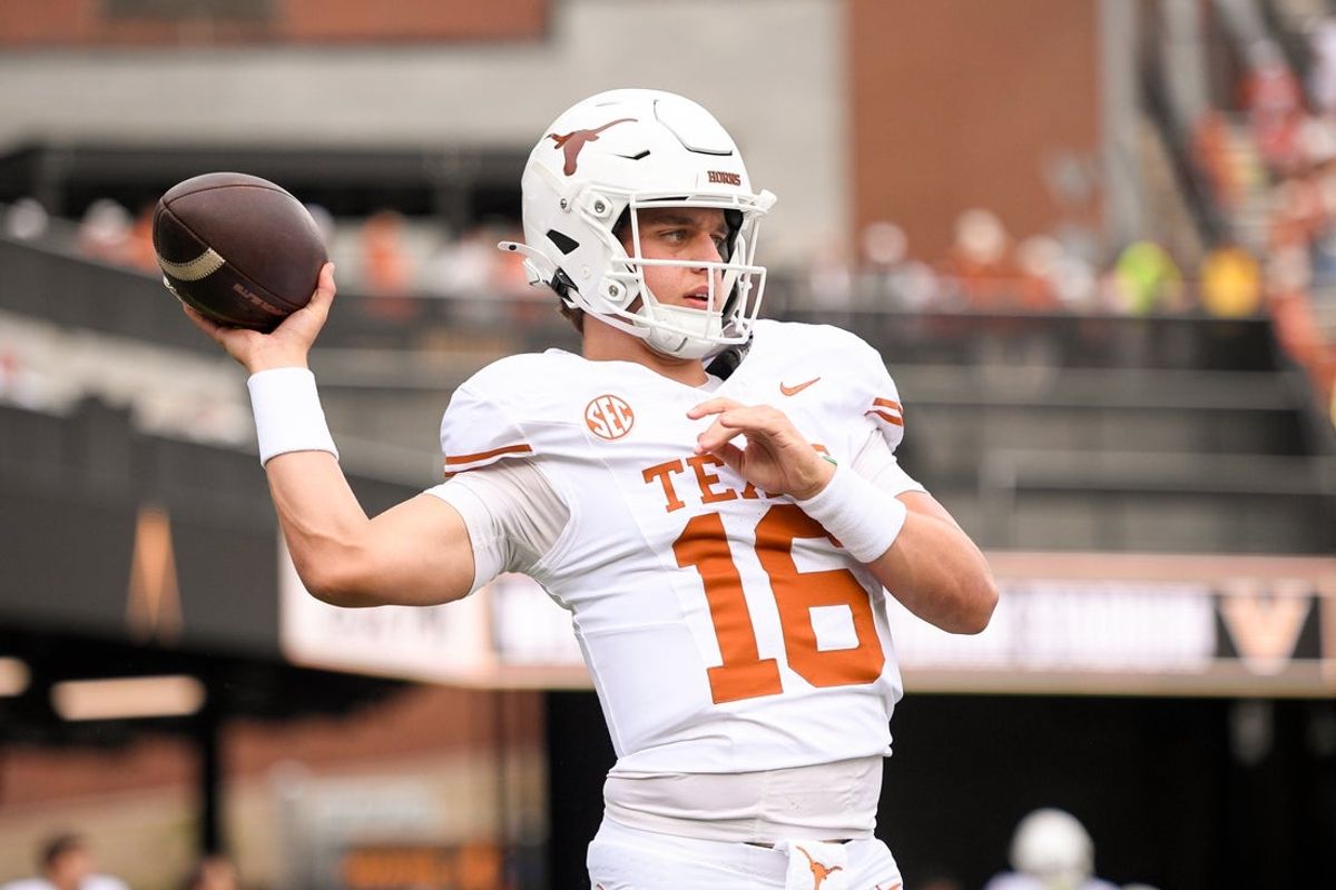 Oct 26, 2024; Nashville, Tennessee, USA;  Texas Longhorns quarterback Arch Manning (16) throws against the Vanderbilt Commodores during pregame warmups at FirstBank Stadium. Mandatory Credit: Steve Roberts-Imagn Images
