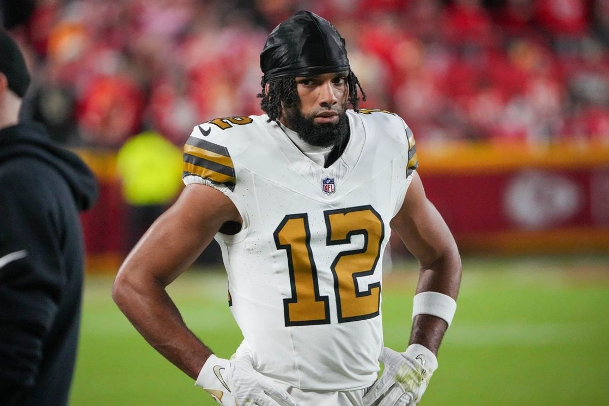 Oct 7, 2024; Kansas City, Missouri, USA; New Orleans Saints wide receiver Chris Olave (12) on the sidelines against the Kansas City Chiefs during the game at GEHA Field at Arrowhead Stadium. Mandatory Credit: Denny Medley-Imagn Images