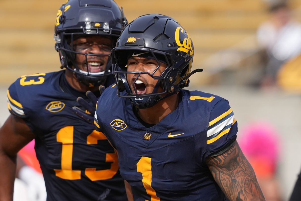 Oct 26, 2024; Berkeley, California, USA; California Golden Bears running back Jaydn Ott (1) reacts after scoring a touchdown against the Oregon State Beavers during the third quarter at California Memorial Stadium. Ott was ruled down before scoring after a video review. Mandatory Credit: Darren Yamashita-Imagn Images