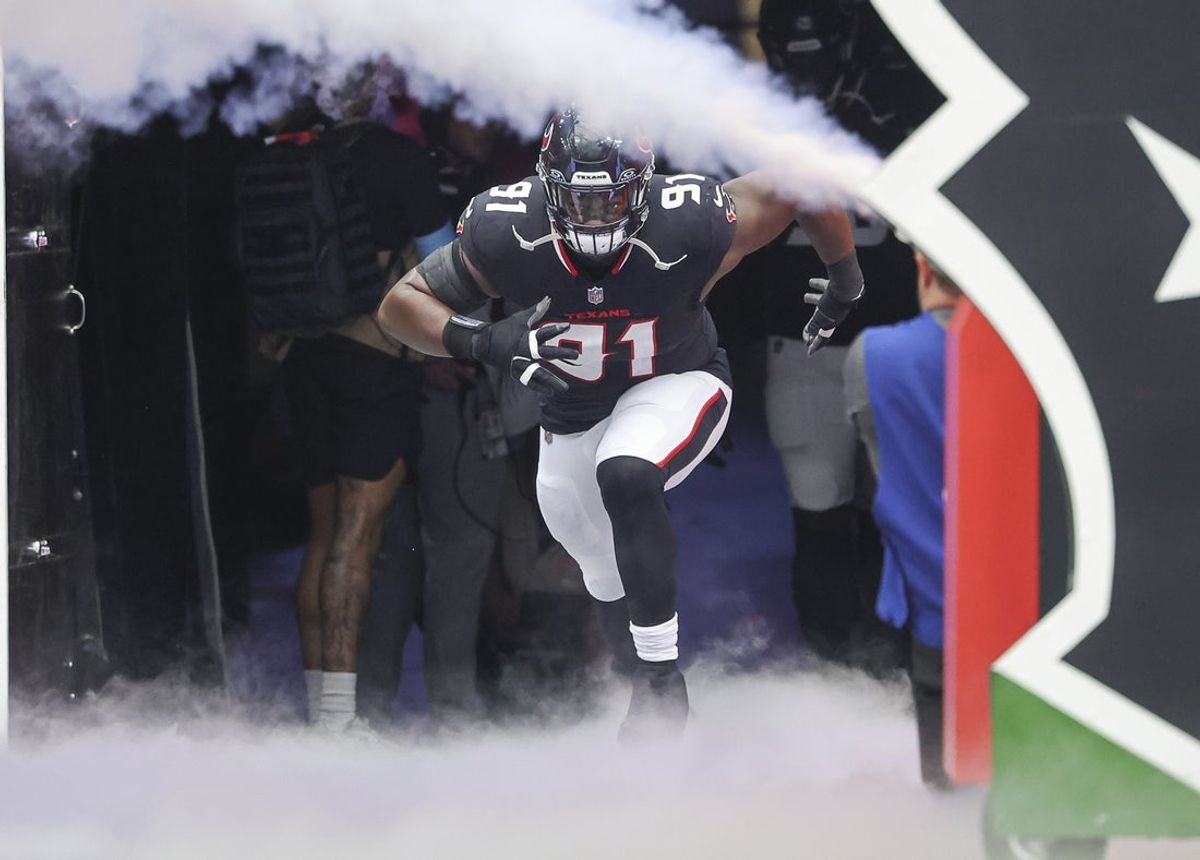 Oct 27, 2024; Houston, Texas, USA; Houston Texans defensive tackle Folorunso Fatukasi (91) runs onto the field before the game against the Indianapolis Colts at NRG Stadium. Mandatory Credit: Troy Taormina-Imagn Images