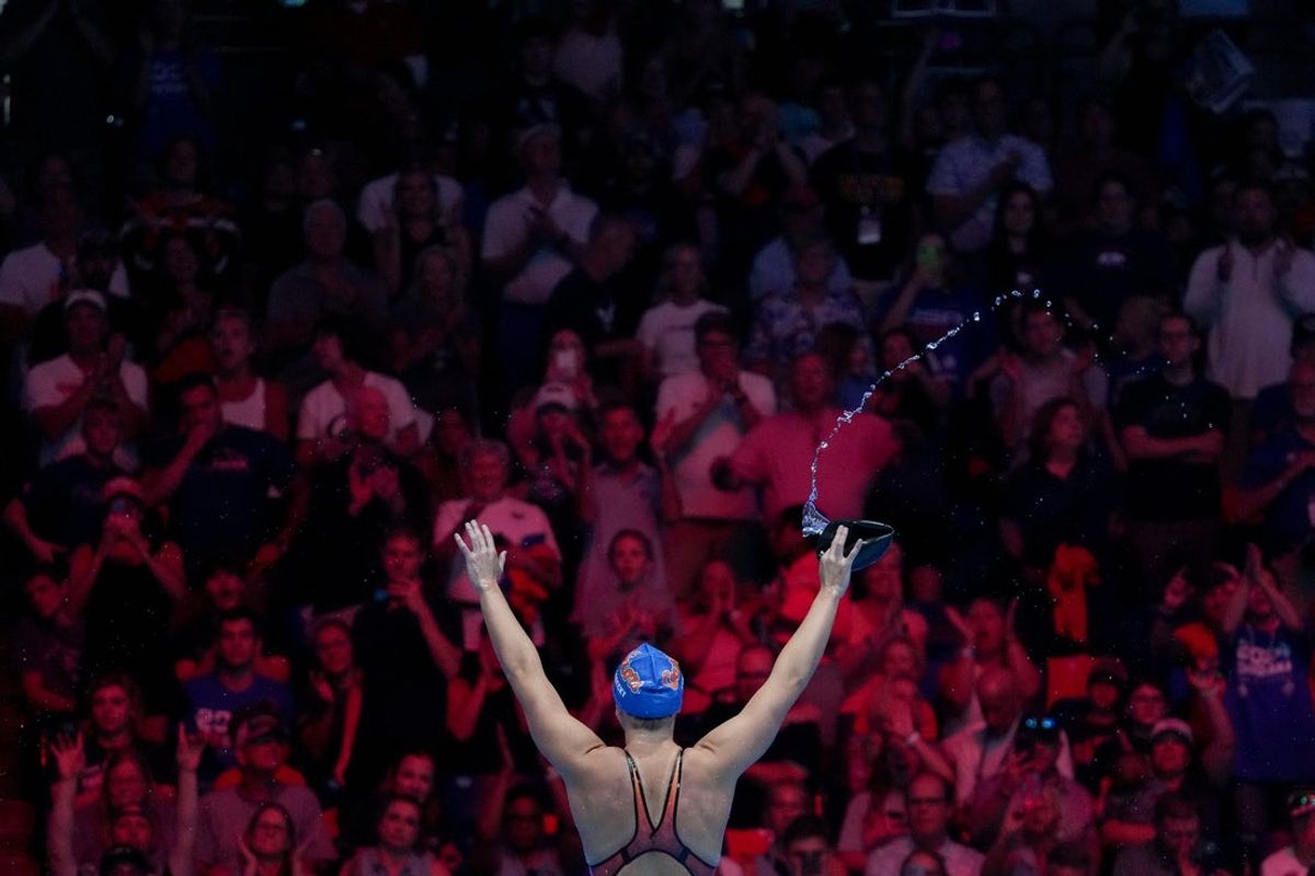Katie Ledecky celebrates after winning the 400 freestyle final Saturday, June 15, 2024, during the first day of competition for the U.S. Olympic Team Swimming Trials at Lucas Oil Stadium in Indianapolis.