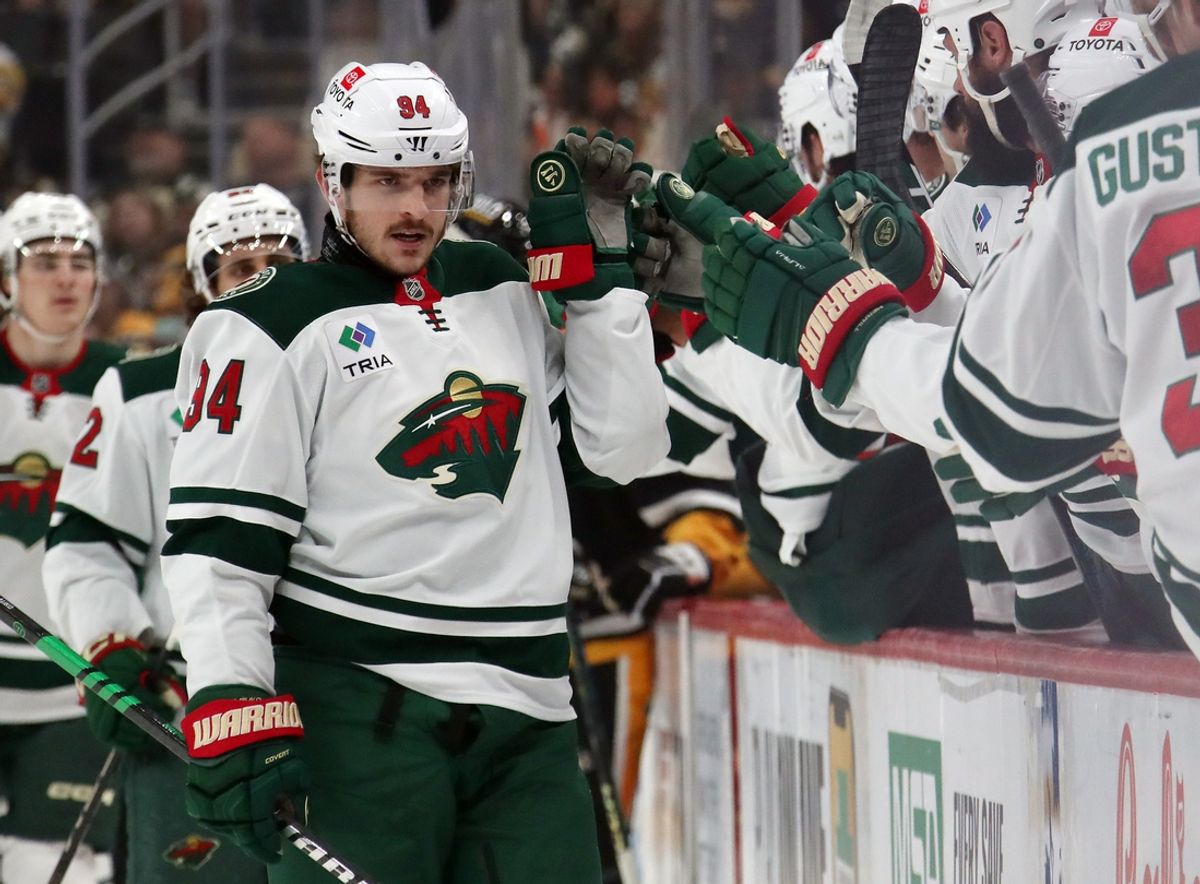 Oct 29, 2024; Pittsburgh, Pennsylvania, USA; Minnesota Wild center Jakub Lauko (94) celebrates his goal with the Wild bench against the Pittsburgh Penguins during the first period at PPG Paints Arena. Mandatory Credit: Charles LeClaire-Imagn Images