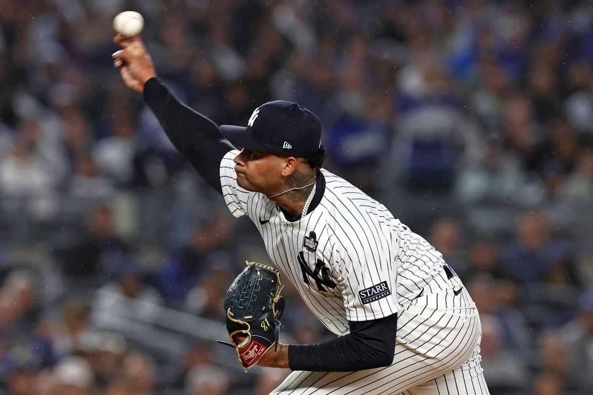 Oct 29, 2024; Bronx, New York, USA; New York Yankees pitcher Luis Gil (81) throws pitch against the Los Angeles Dodgers in the first inning during game four of the 2024 MLB World Series at Yankee Stadium. Mandatory Credit: Vincent Carchietta-Imagn Images