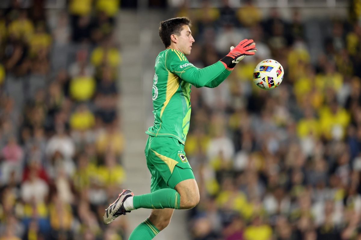 Oct 29, 2024; Columbus, Ohio, USA; Columbus Crew goalkeeper Patrick Schulte (28) makes a save in the second half against the New York Red Bulls in a 2024 MLS Cup Playoffs Round One match at Lower.com Field. Mandatory Credit: Joseph Maiorana-Imagn Images