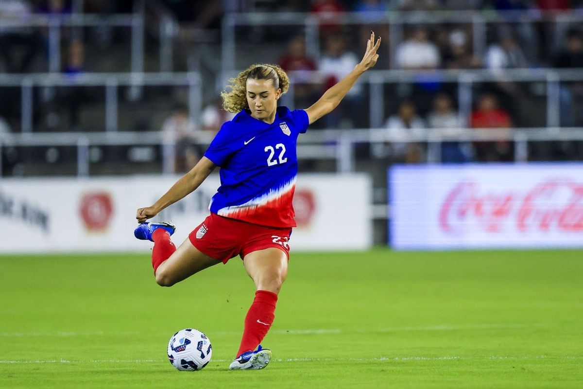 Oct 30, 2024; Louisville, Kentucky, USA; United States defender Eva Gaetino (22) kicks the ball against Argentina in the first half at Lynn Family Stadium. Mandatory Credit: Katie Stratman-Imagn Images