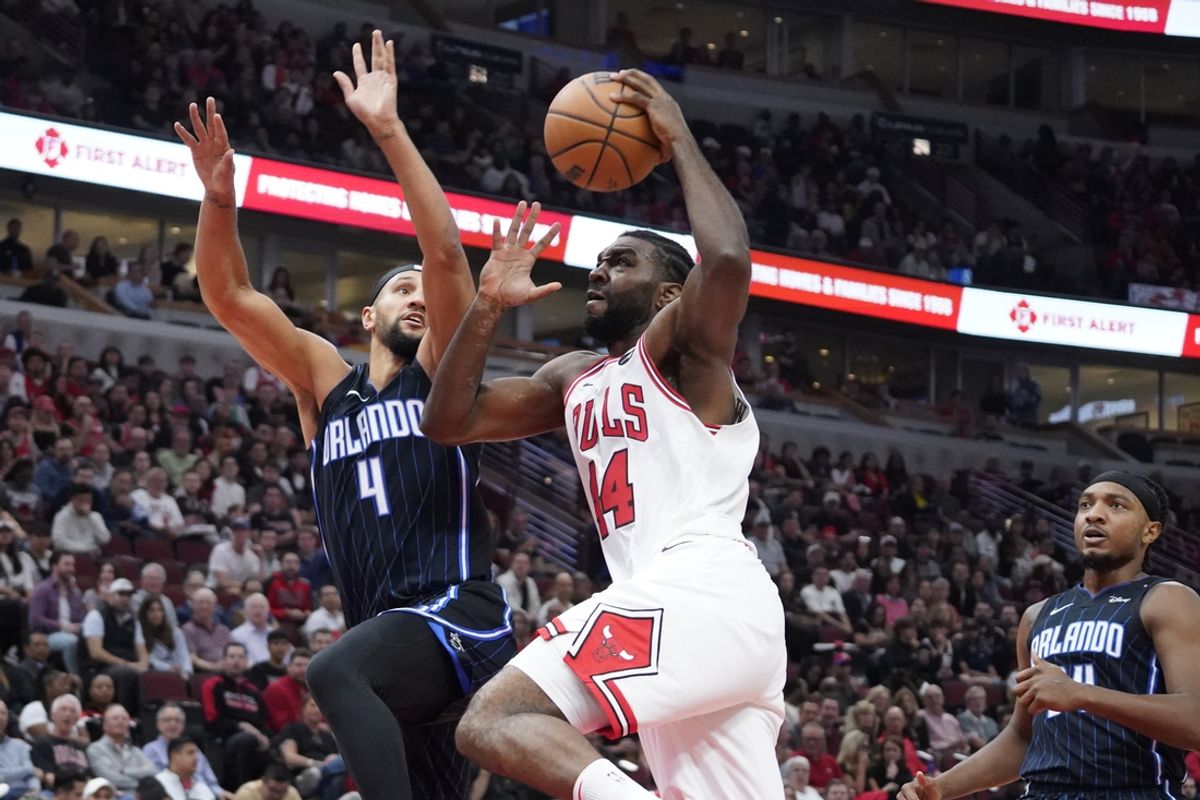 Oct 30, 2024; Chicago, Illinois, USA; Orlando Magic guard Jalen Suggs (4) defends Chicago Bulls forward Patrick Williams (44) during the first quarter at United Center. Mandatory Credit: David Banks-Imagn Images