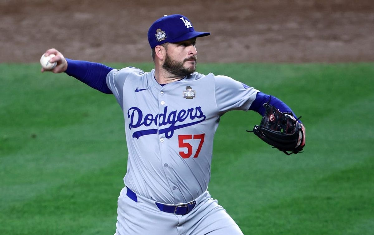 Oct 30, 2024; New York, New York, USA; Los Angeles Dodgers pitcher Ryan Brasier (57) throws during the third inning against the New York Yankees in game five of the 2024 MLB World Series at Yankee Stadium. Mandatory Credit: Wendell Cruz-Imagn Images