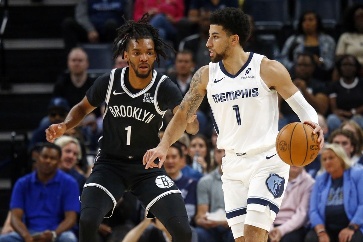 Oct 30, 2024; Memphis, Tennessee, USA; Memphis Grizzlies guard Scotty Pippen Jr. (1) dribbles as Brooklyn Nets forward Ziaire Williams (1) defends during the first half at FedExForum. Mandatory Credit: Petre Thomas-Imagn Images