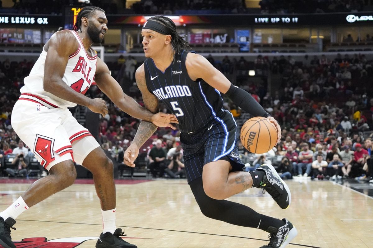 Oct 30, 2024; Chicago, Illinois, USA; Chicago Bulls forward Patrick Williams (44) defends Orlando Magic forward Paolo Banchero (5) during the second half at United Center. Mandatory Credit: David Banks-Imagn Images