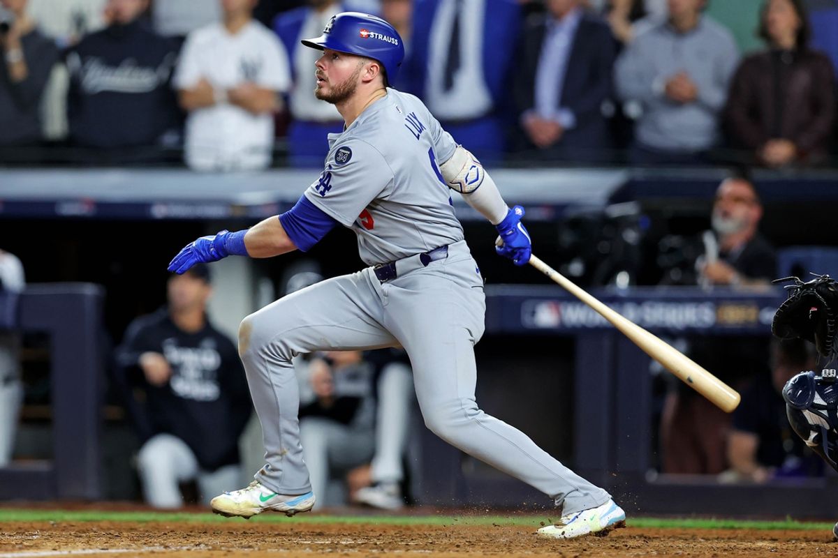 Oct 30, 2024; New York, New York, USA; Los Angeles Dodgers second baseman Gavin Lux (9) hits a sacrifice fly during the eighth inning against the New York Yankees in game four of the 2024 MLB World Series at Yankee Stadium. Mandatory Credit: Brad Penner-Imagn Images