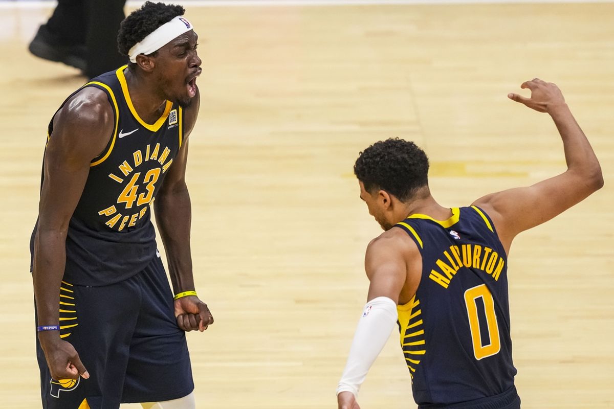 Oct 30, 2024; Indianapolis, Indiana, USA; Indiana Pacers forward Pascal Siakam (43) and guard Tyrese Haliburton (0) celebrate Siakam’s game-winning three point basket against the Boston Celtics at Gainbridge Fieldhouse. Mandatory Credit: Grace Smith-Imagn Images