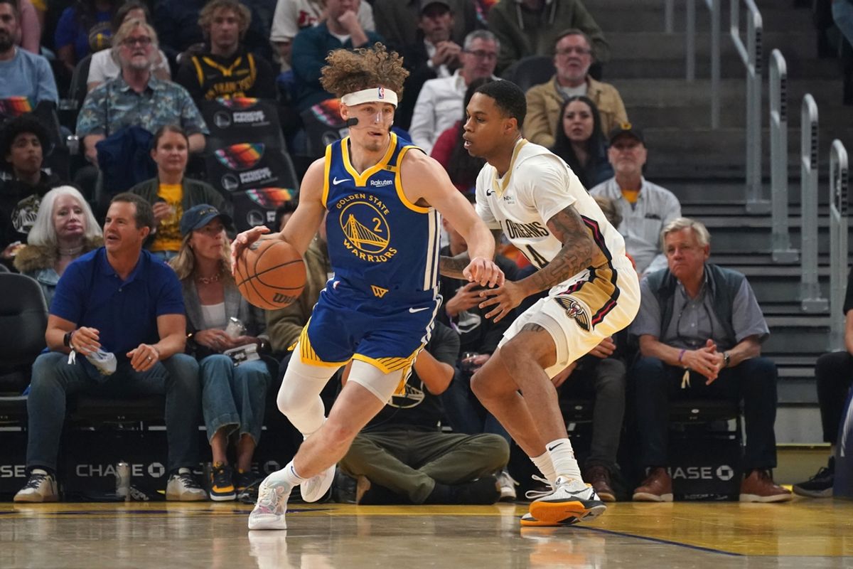 Oct 30, 2024; San Francisco, California, USA; Golden State Warriors guard Brandin Podziemski (2) dribbles against New Orleans Pelicans guard Jordan Hawkins (24) during the first quarter at Chase Center. Mandatory Credit: David Gonzales-Imagn Images