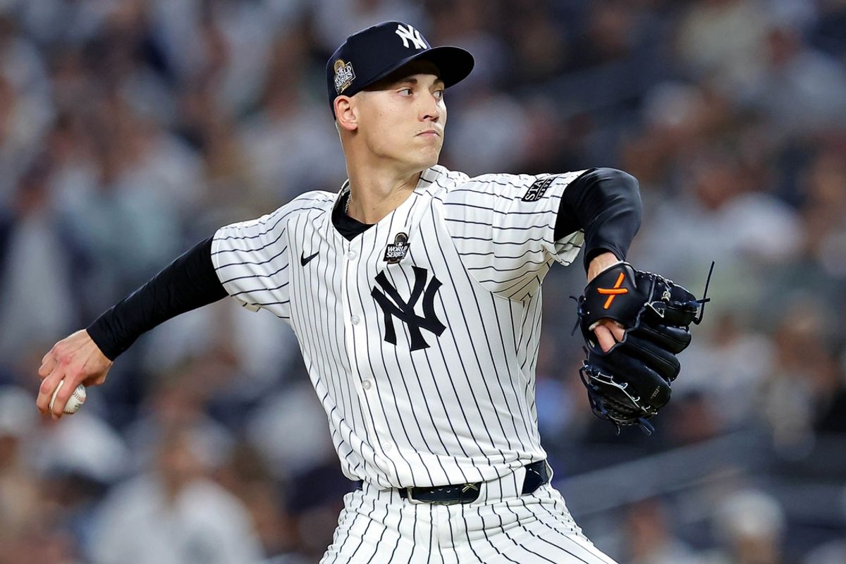 Oct 30, 2024; New York, New York, USA; New York Yankees pitcher Luke Weaver (30) pitches during the ninth inning against the Los Angeles Dodgers in game four of the 2024 MLB World Series at Yankee Stadium. Mandatory Credit: Brad Penner-Imagn Images