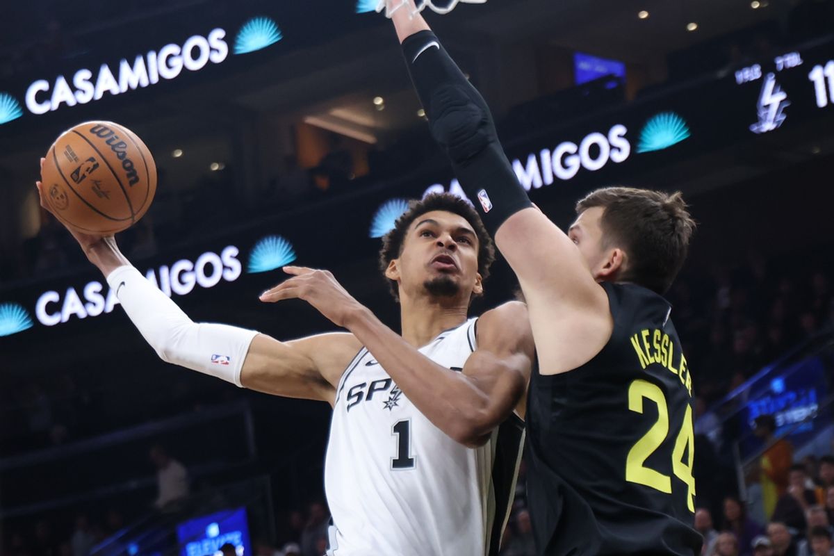 Oct 31, 2024; Salt Lake City, Utah, USA; San Antonio Spurs center Victor Wembanyama (1) goes to the basket against Utah Jazz center Walker Kessler (24) during the first quarter at Delta Center. Mandatory Credit: Rob Gray-Imagn Images