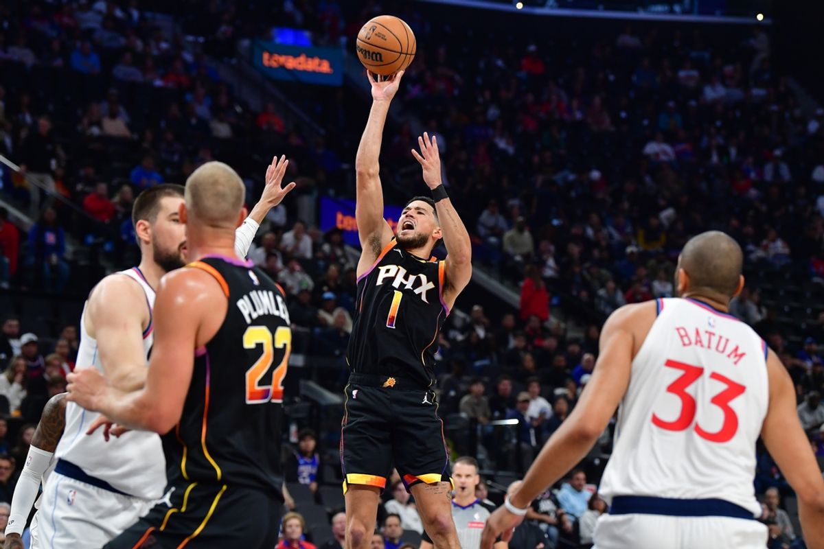Oct 31, 2024; Inglewood, California, USA; Phoenix Suns guard Devin Booker (1) shoots against the Los Angeles Clippers during the first half at Intuit Dome. Mandatory Credit: Gary A. Vasquez-Imagn Images