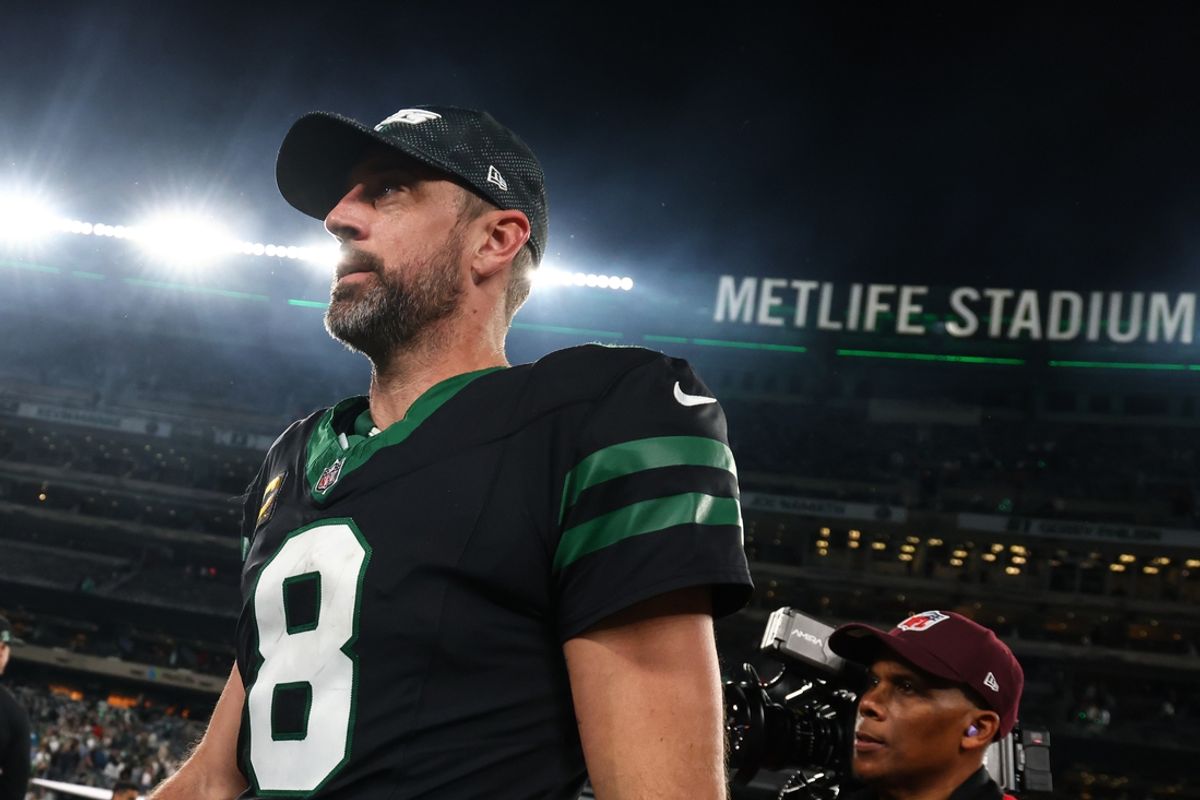 Oct 31, 2024; East Rutherford, New Jersey, USA; New York Jets quarterback Aaron Rodgers (8) walks off the field after the Jets win over the Houston Texans at MetLife Stadium. Mandatory Credit: Ed Mulholland-Imagn Images