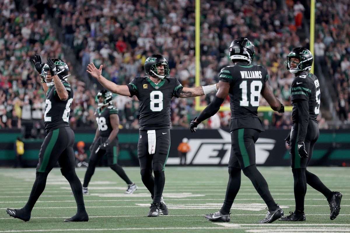 Oct 31, 2024; East Rutherford, New Jersey, USA; New York Jets quarterback Aaron Rodgers (8) reacts after a touchdown against the Houston Texans by wide receiver Garrett Wilson (5) during the fourth quarter at MetLife Stadium. Mandatory Credit: Brad Penner-Imagn Images