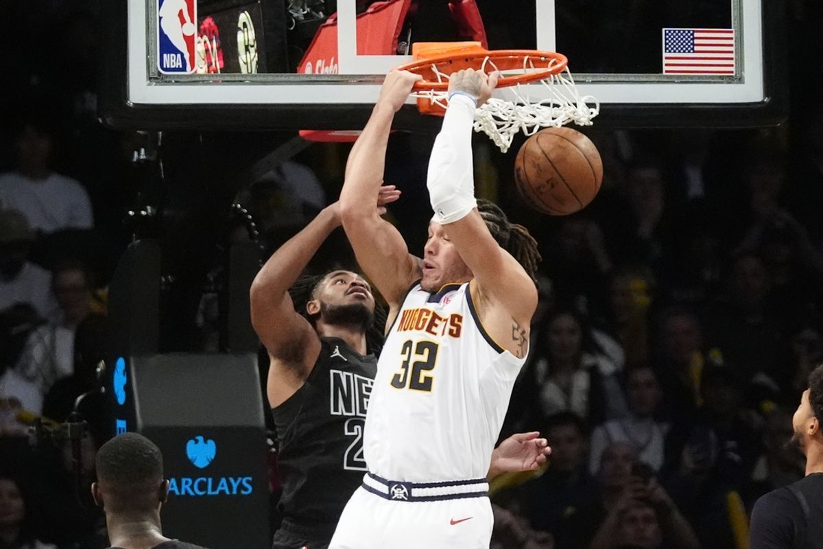 Oct 29, 2024; Brooklyn, New York, USA; Denver Nuggets power forward Aaron Gordon (32) dunks the ball against the Brooklyn Nets during the second half at Barclays Center. Mandatory Credit: Gregory Fisher-Imagn Images