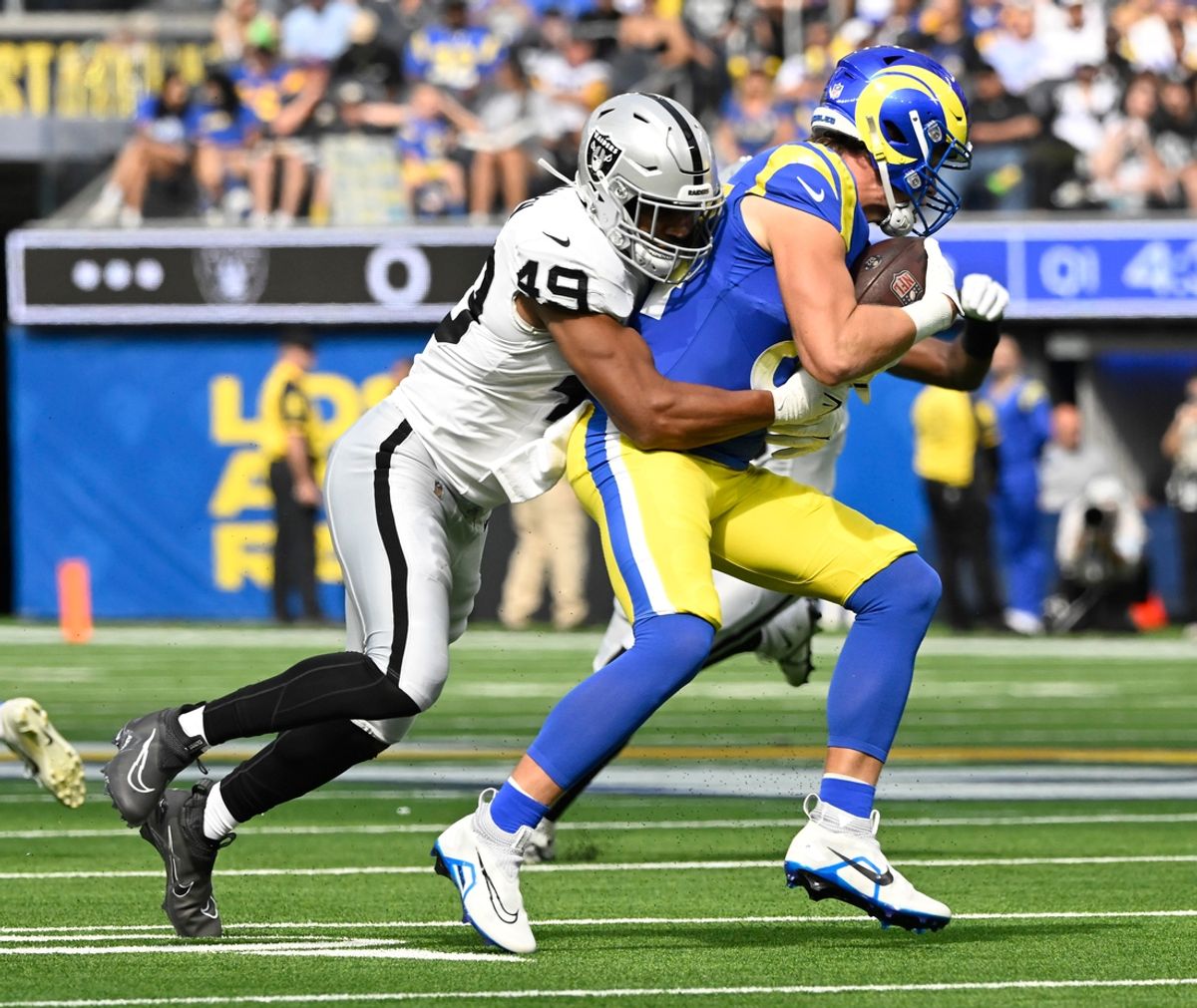 Oct 20, 2024; Inglewood, California, USA; Las Vegas Raiders defensive end Charles Snowden (49) tackles Los Angeles Rams tight end Hunter Long (84)  at SoFi Stadium. Mandatory Credit: Robert Hanashiro-Imagn Images