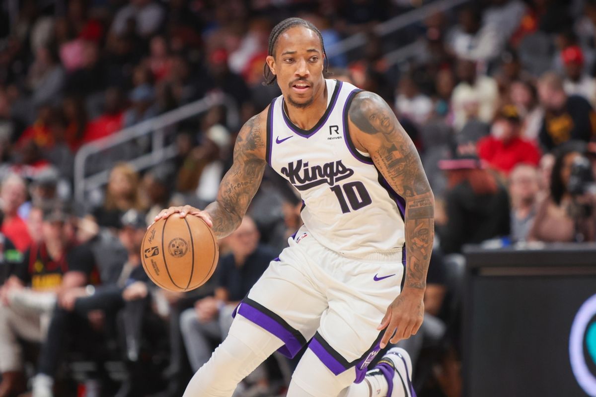 Nov 1, 2024; Atlanta, Georgia, USA; Sacramento Kings forward DeMar DeRozan (10) dribbles against the Atlanta Hawks in the first quarter at State Farm Arena. Mandatory Credit: Brett Davis-Imagn Images