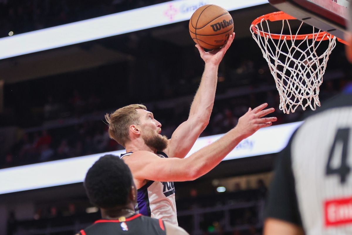 Nov 1, 2024; Atlanta, Georgia, USA; Sacramento Kings forward Domantas Sabonis (11) shoots against the Atlanta Hawks in the second quarter at State Farm Arena. Mandatory Credit: Brett Davis-Imagn Images