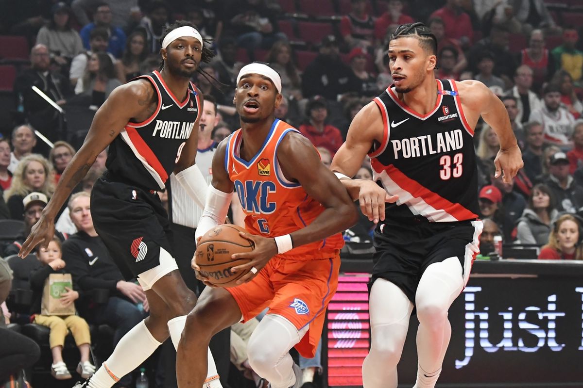 Nov 1, 2024; Portland, Oregon, USA; Oklahoma City Thunder guard Shai Gilgeous-Alexander (2) drives to the basket against Portland Trailblazers forward Toumani Camara (33) during the first quarter at Moda Center. Mandatory Credit: Brian Murphy-Imagn Images