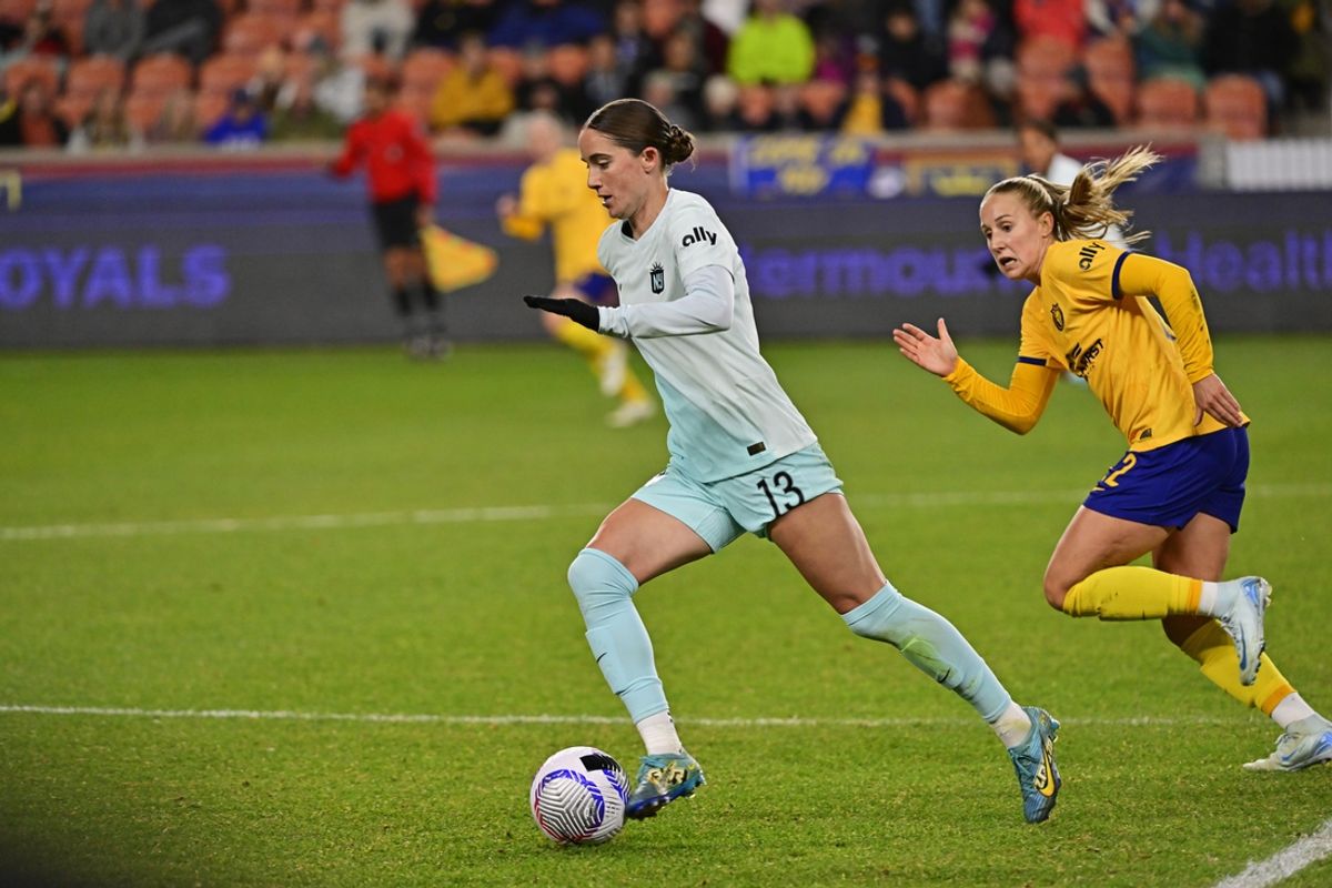 Nov 1, 2024; Sandy, Utah, USA; NJ/NY Gotham FC forward Ella Stevens (13) controls the ball as Utah Royals FC midfielder Dana Foederer (22) defends during the first half at America First Field. Mandatory Credit: Christopher Creveling-Imagn Images