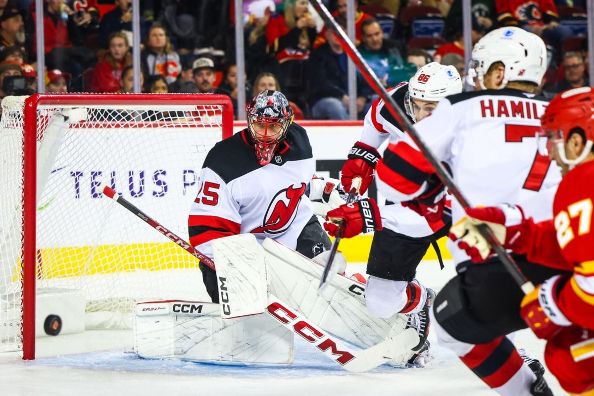 Nov 1, 2024; Calgary, Alberta, CAN; New Jersey Devils goaltender Jacob Markstrom (25) guards his net against the Calgary Flames during the second period at Scotiabank Saddledome. Mandatory Credit: Sergei Belski-Imagn Images
